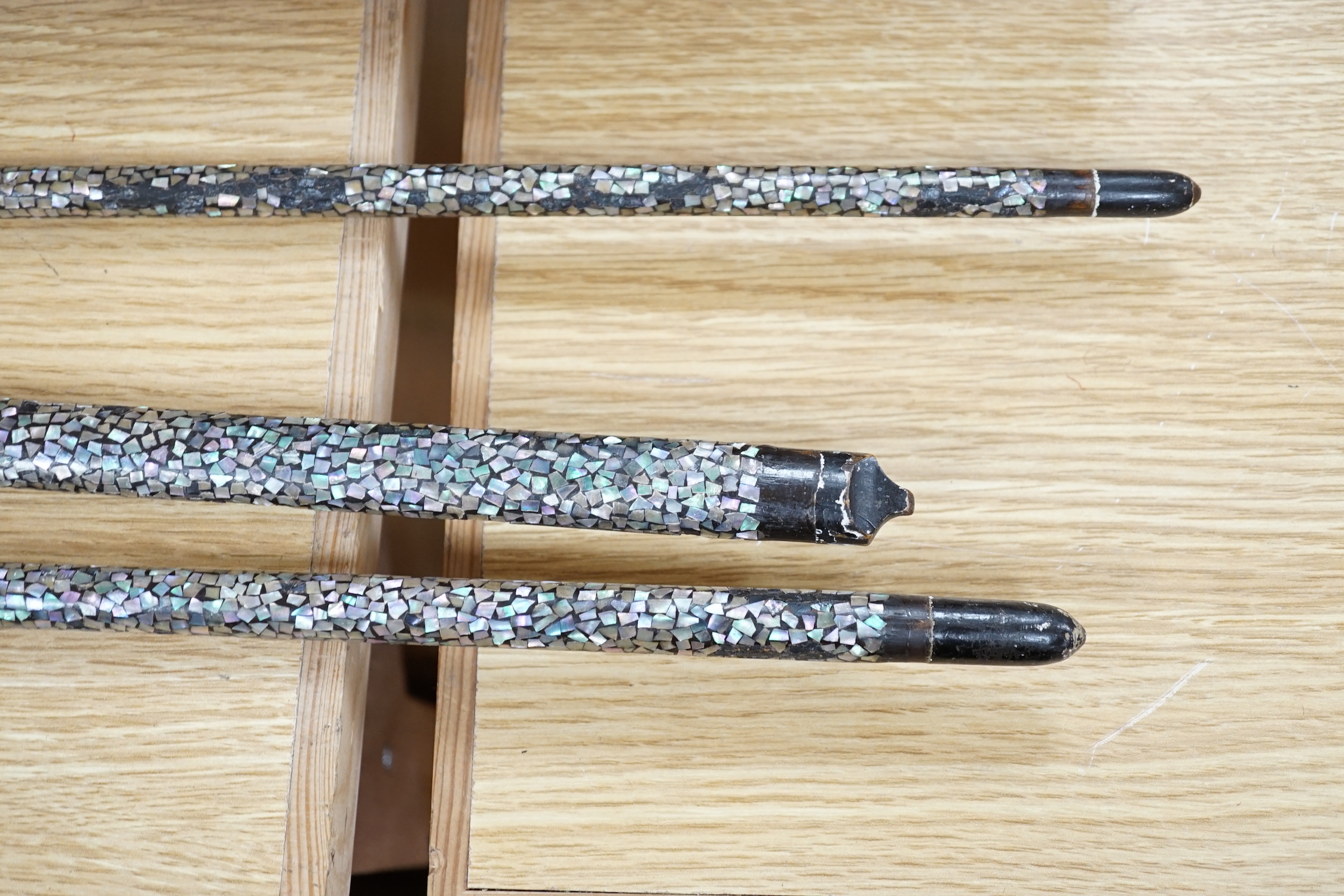 A set of three Japanese Nanban lacquer handled Samurai polearm weapons, Edo period, the largest 100cm in length
